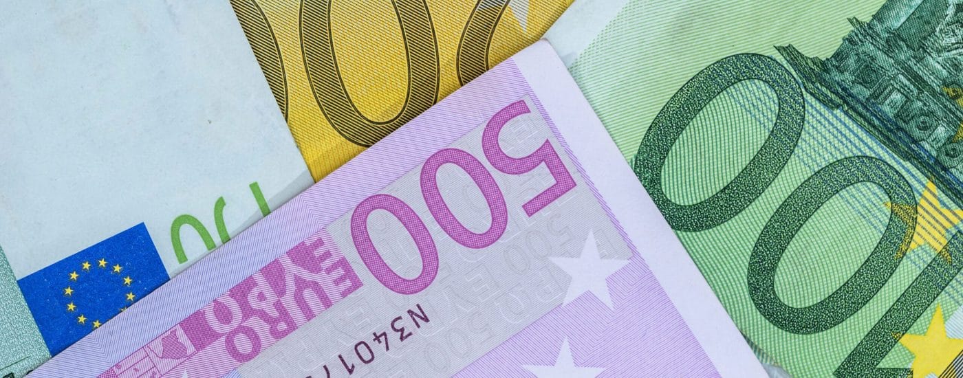 many Euro banknotes as  background