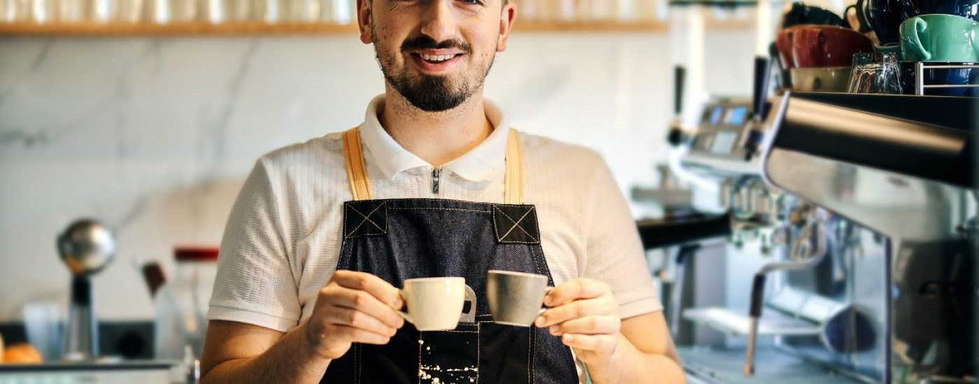 Portrait of a professional barista working in a cafe
